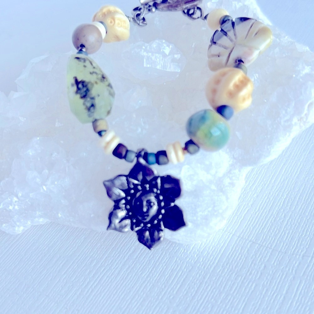 Silver and Green Beaded Bracelet with Sun Flower Charm. 6 1/2 inches in length
